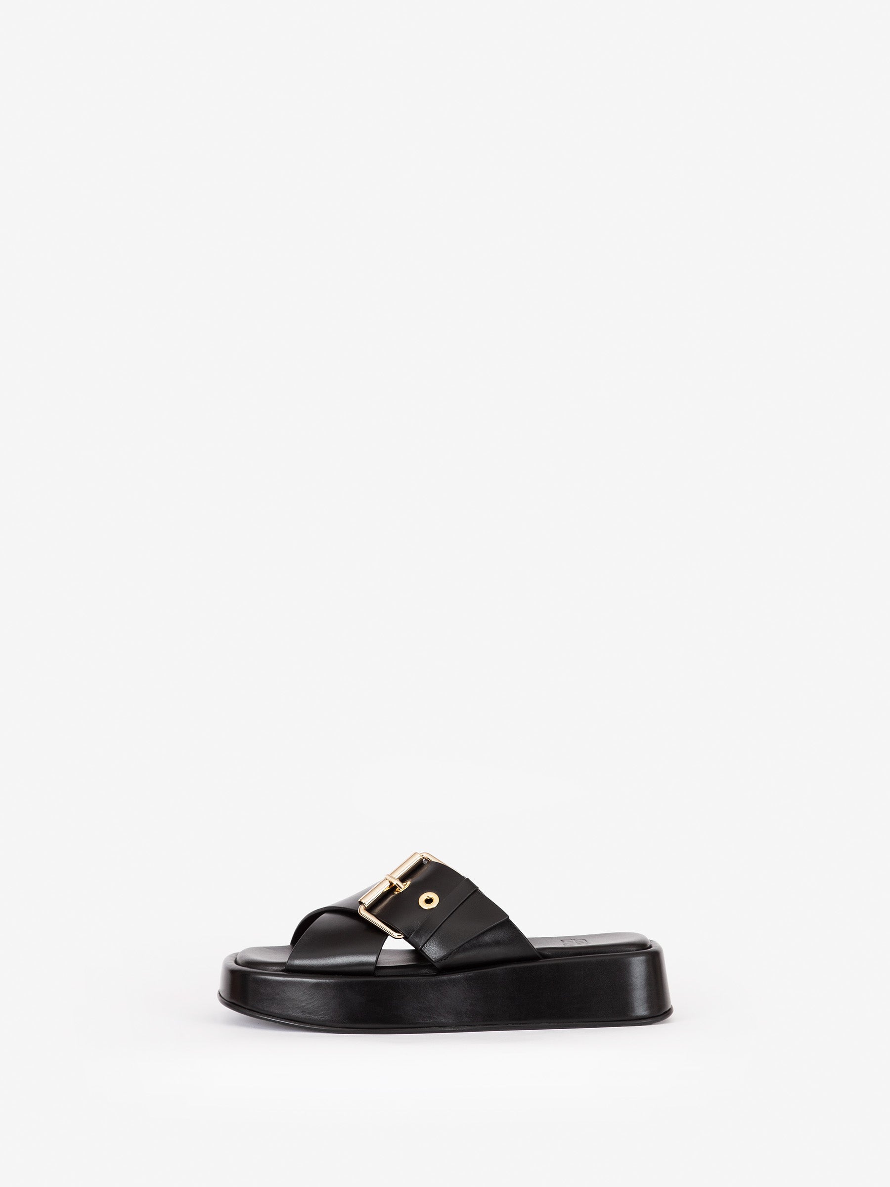 Black chunky "DETOX" flatform sandal from Swedish premium shoe brand ANNY NORD with heavy gold trims for an everyday splash of luxe.