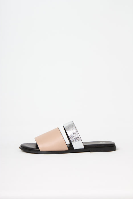 BUSY DOING NOTHING is a comfortable luxury slide sandal in pale nude and silver leather from Swedish shoe and accessory brand ANNY NORD
