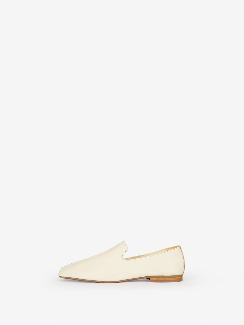 Comfy and chic loafer with a super soft decnstructed construction vanilla colorway viewed from side 