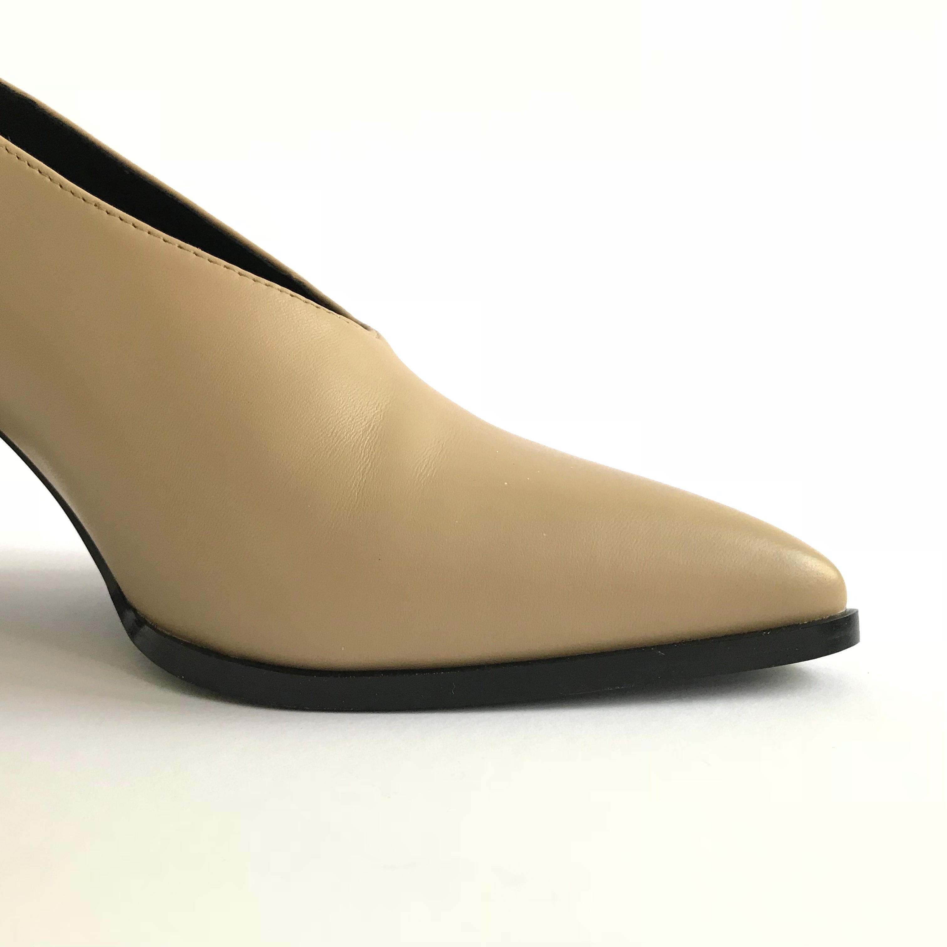 Side detail of Roach Killer V-cut pump from Swedish shoe brand ANNY NORD.  A classic shoe with a modern twist. 